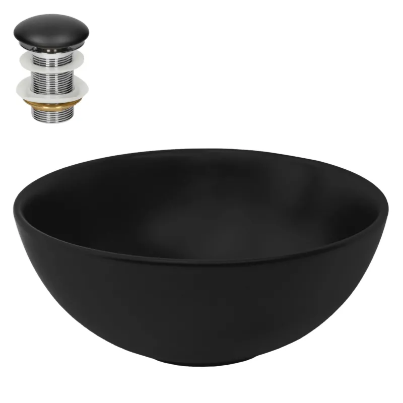Schwarze, runde Waschschüssel auf einem hellen Holzuntergrund.