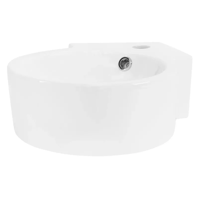Weißes, rundes Waschbecken mit seitlicher Abflussöffnung.
